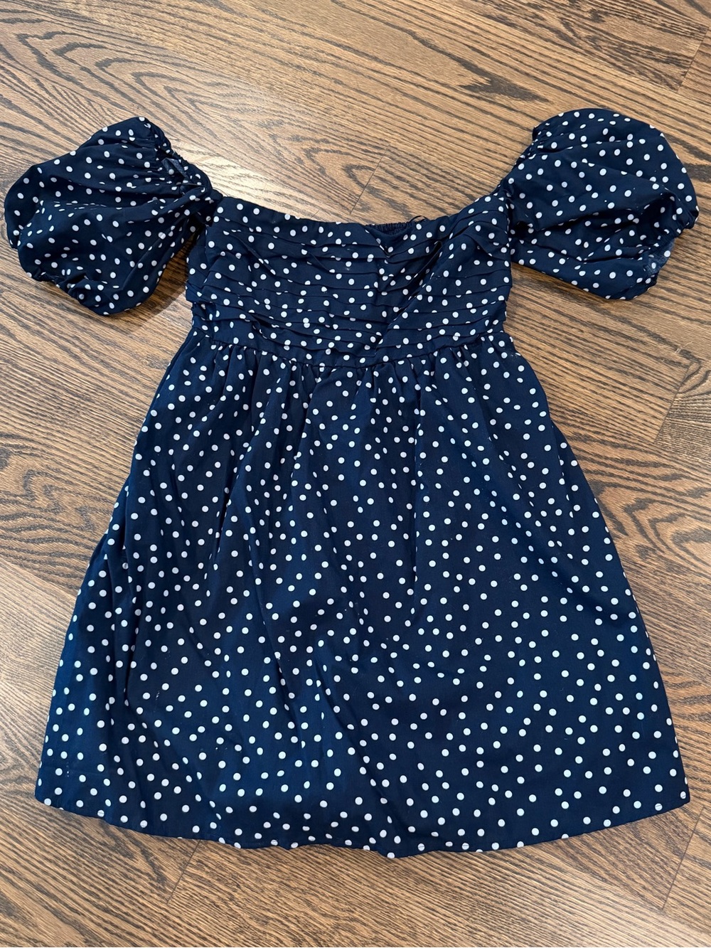 Navy Polka Dot Puff Sleeve dress with hidden shorts